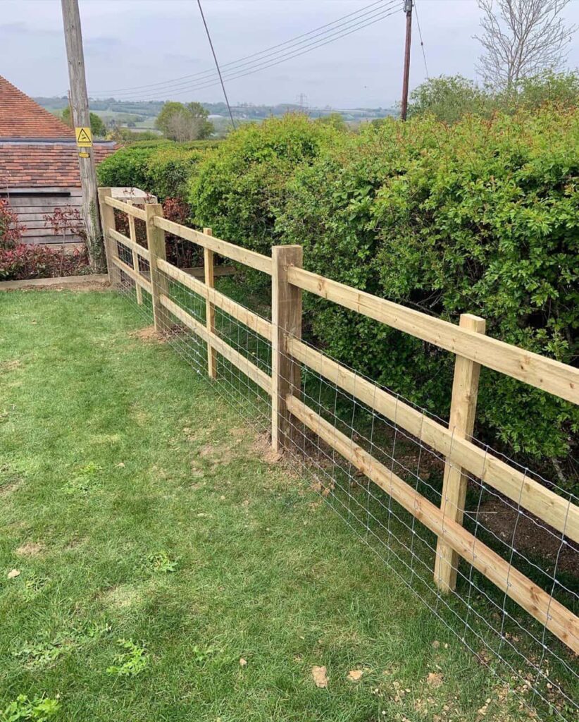 This is a photo of a picket fence and picket gate installed by Fast Fix Fencing Fakenham